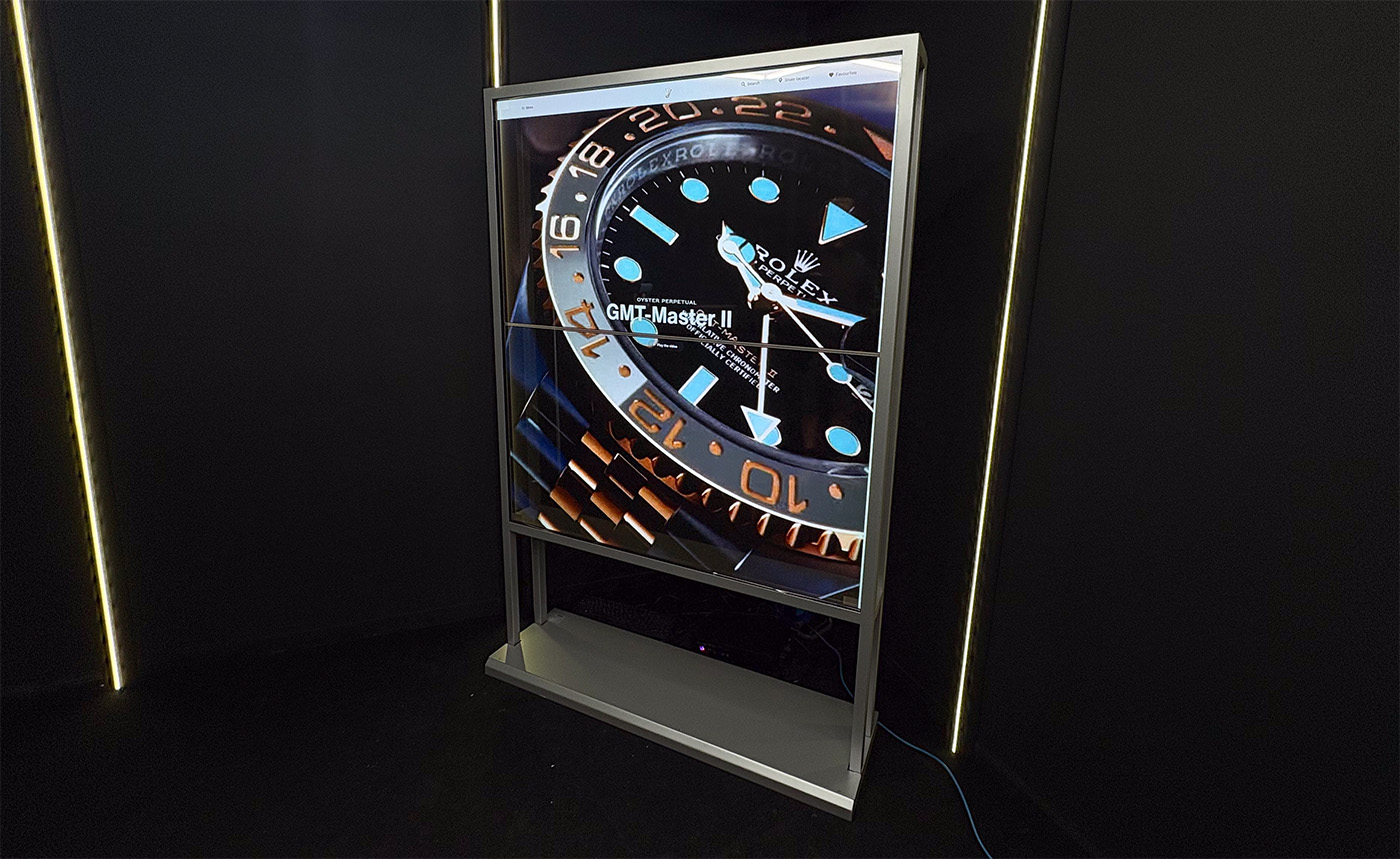 Transparent OLED Video Wall displaying an image of a Rolex watch