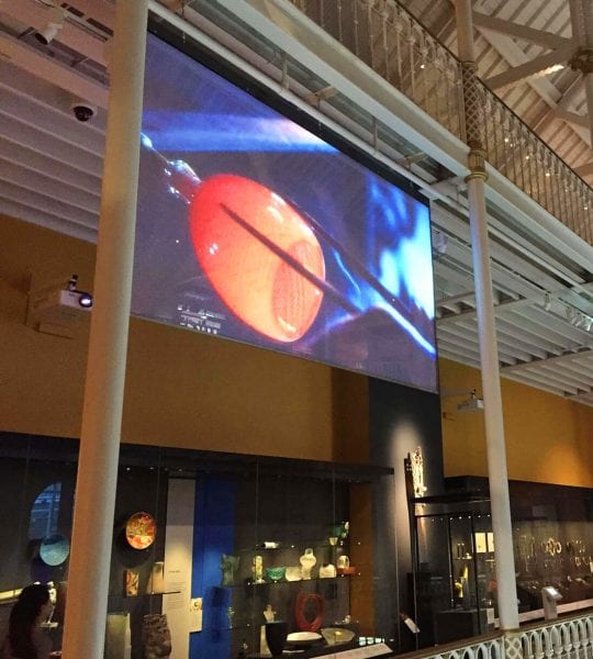 Projection Screens can hang safely from a ceiling when eye-line space is scarce